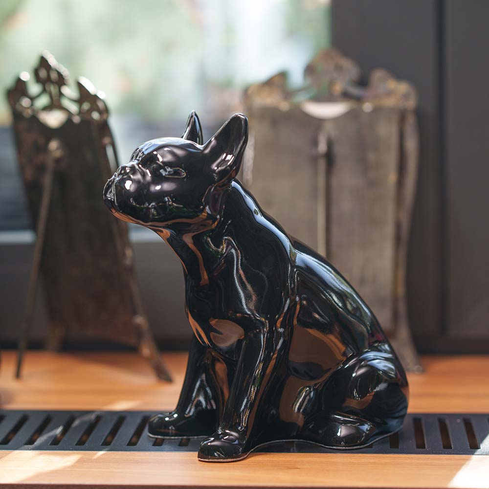 French Bulldog Pet Urn for Ashes in Glossy Black on Shelf Left