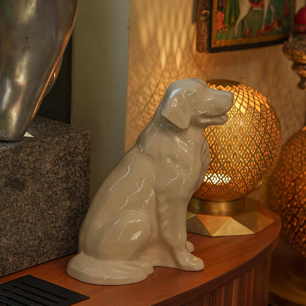 Golden Retriever Pet Urn for Ashes in Cream on Shelf Facing Right