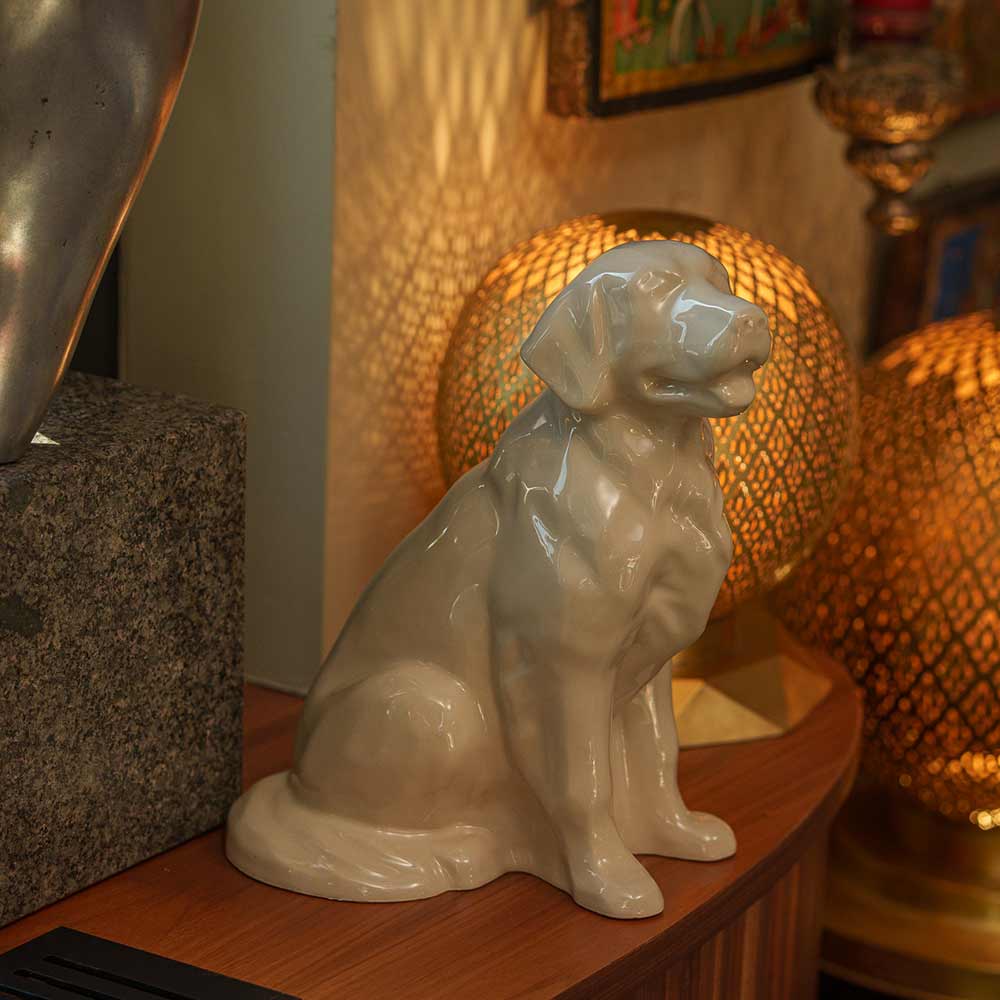 Golden Retriever Pet Urn for Ashes in Cream on Shelf Right Facing