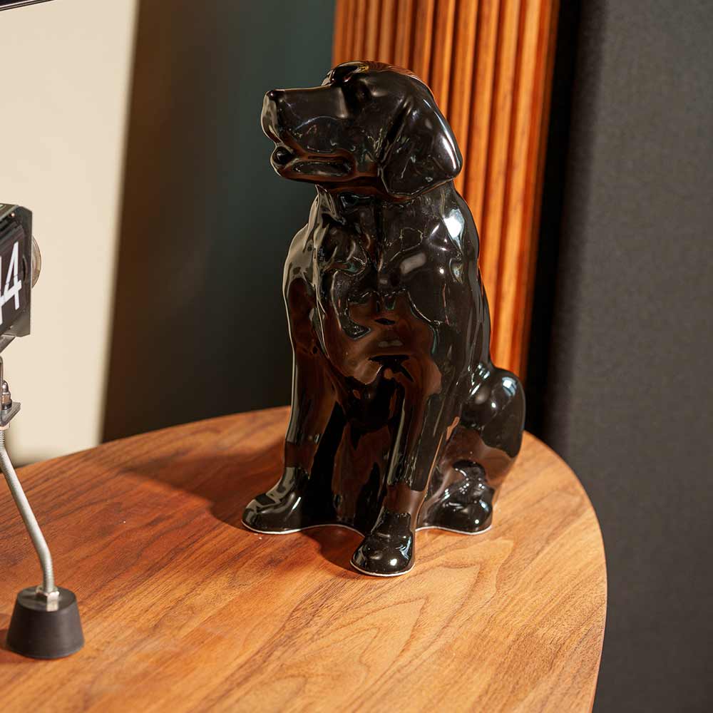 Golden Retriever Pet Urn for Ashes in Glossy Black on Table Left Facing