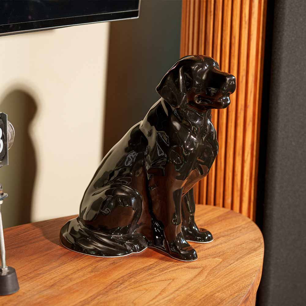 Golden Retriever Pet Urn for Ashes in Glossy Black on Table