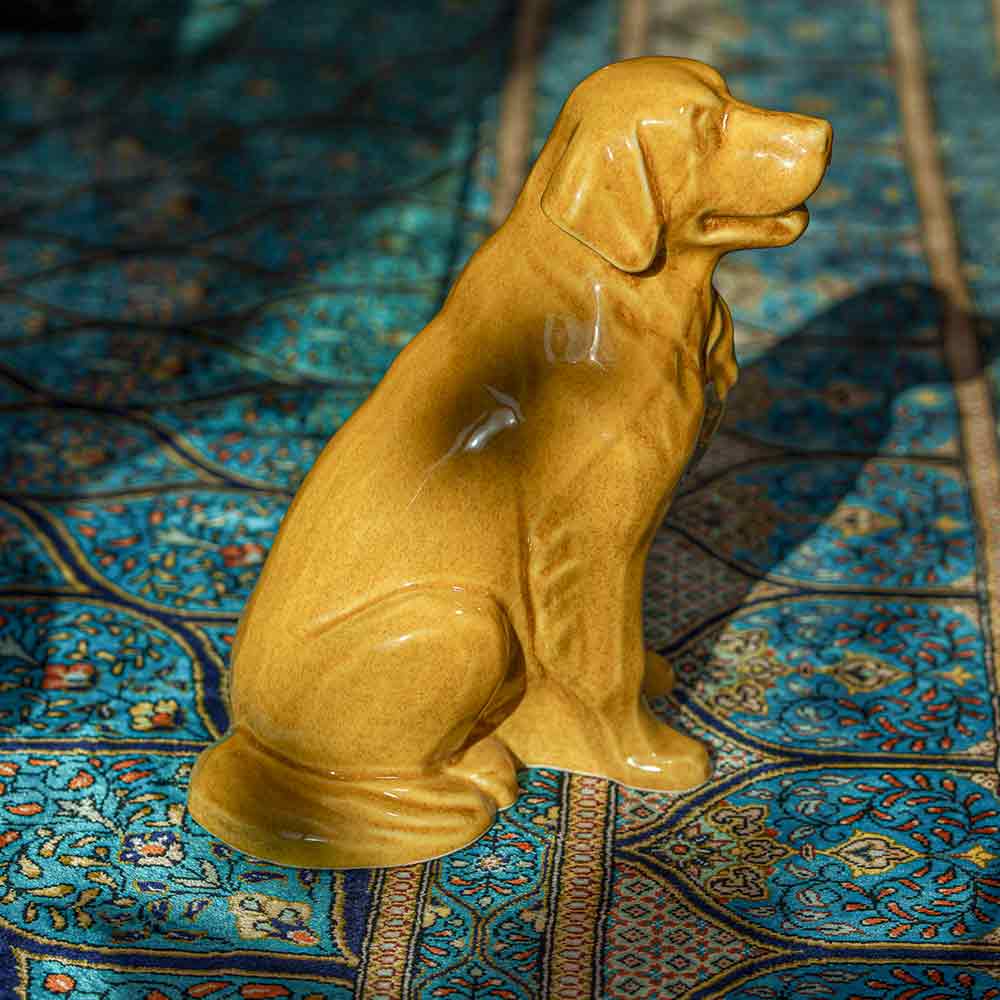 Golden Retriever Pet Urn for Ashes in Gold on Rug Right View