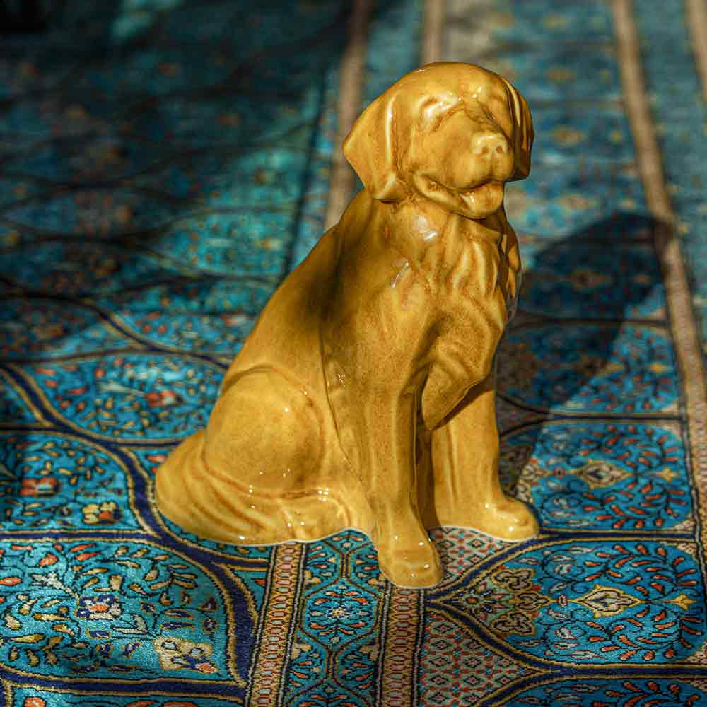 Golden Retriever Pet Urn for Ashes in Gold on Rug