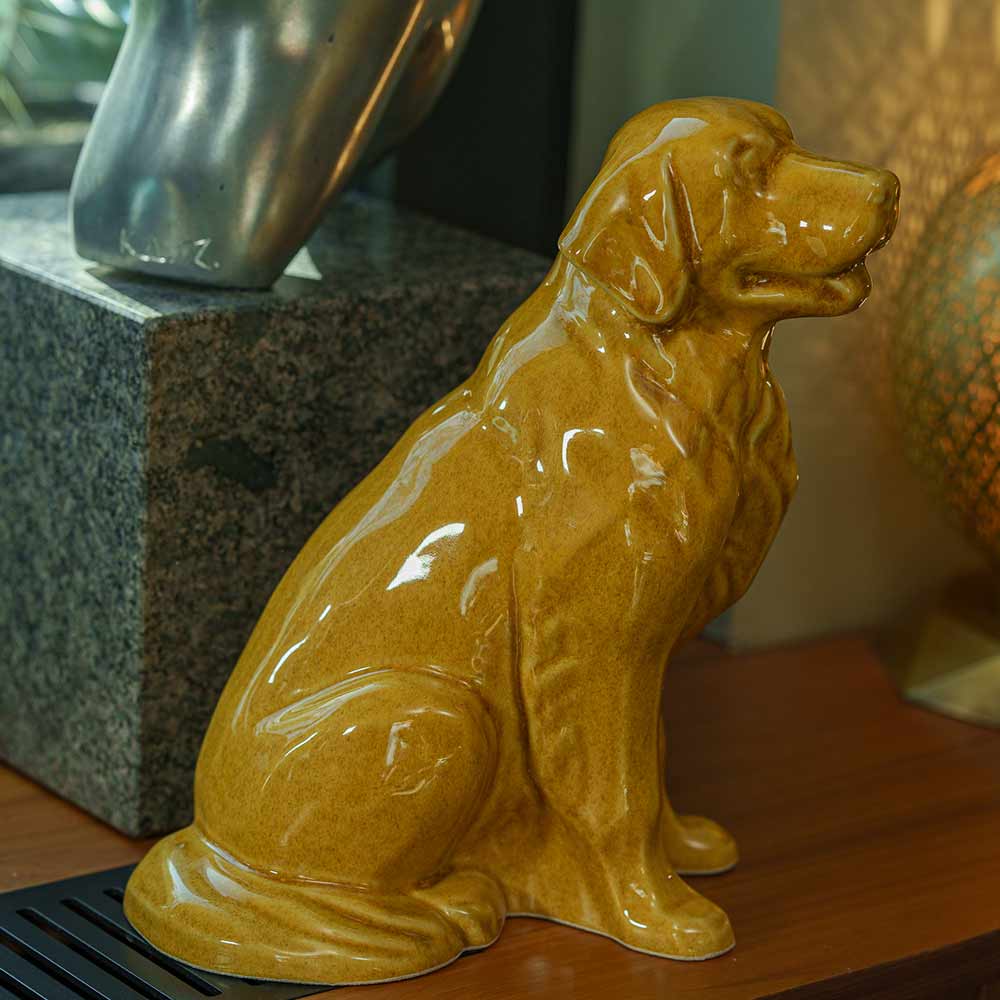 Golden Retriever Pet Urn for Ashes in Gold on Shelf Right Close Up