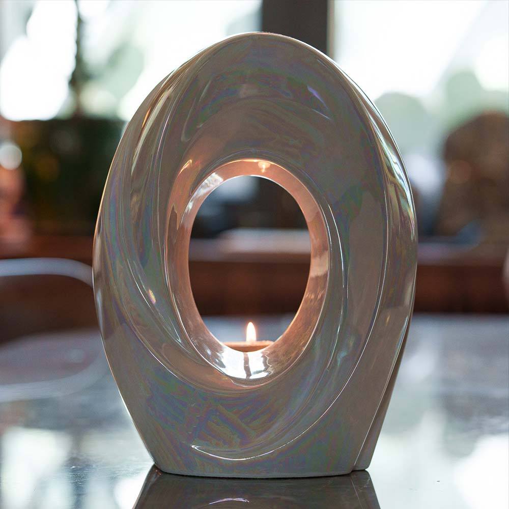 The Passage Adult Cremation Urn for Ashes in Pearlescent White Darker Lighting