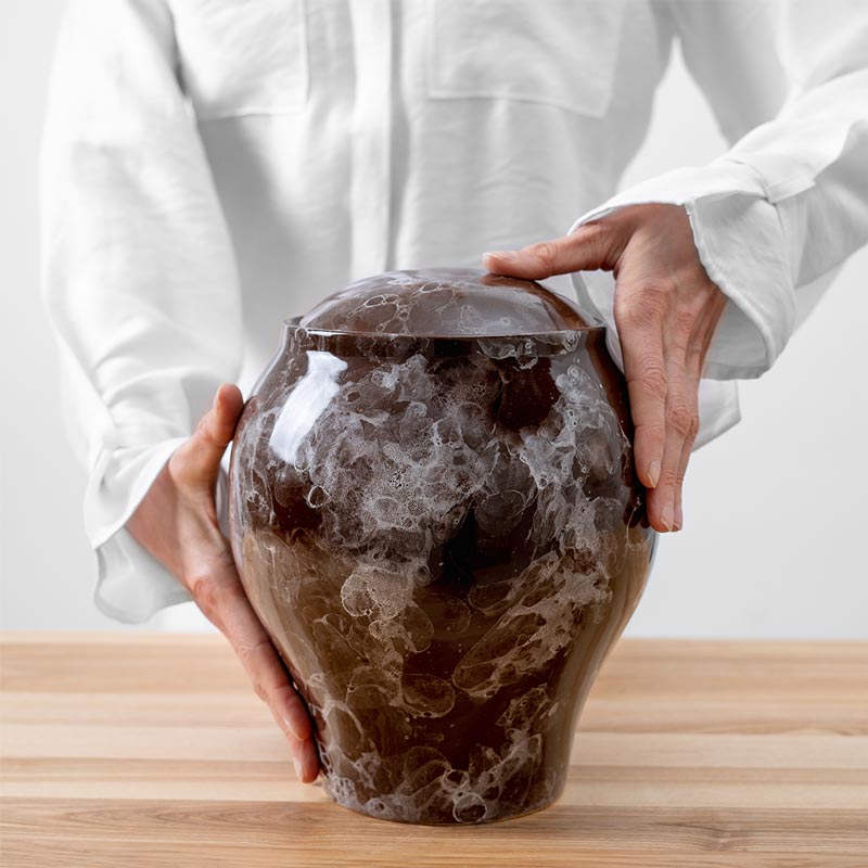 Freckled Classic Cremation Urn for Ashes Brown Being Held
