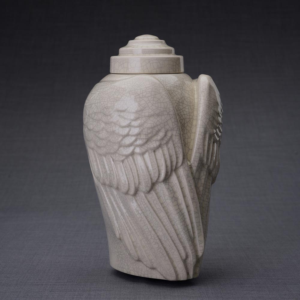 Angel wing outlet urn